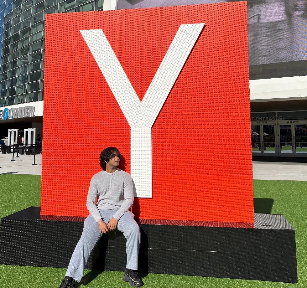 Mukund Agarwal at the Y Combinator sign, Chase Center, San Francisco